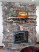 Rock Fireplace handcrafted with log mantle, big sky mt